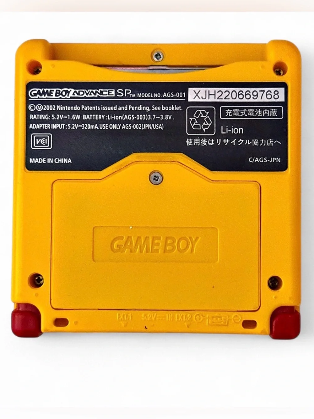 Nintendo Yellow Pikachu Face Game Boy Advance SP with Mixed Game Cartridges